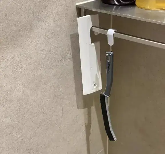 Cleaning brush hanging